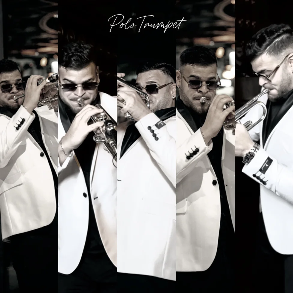 Live trumpet player in white tuxedo, ideal for a Mykonos wedding